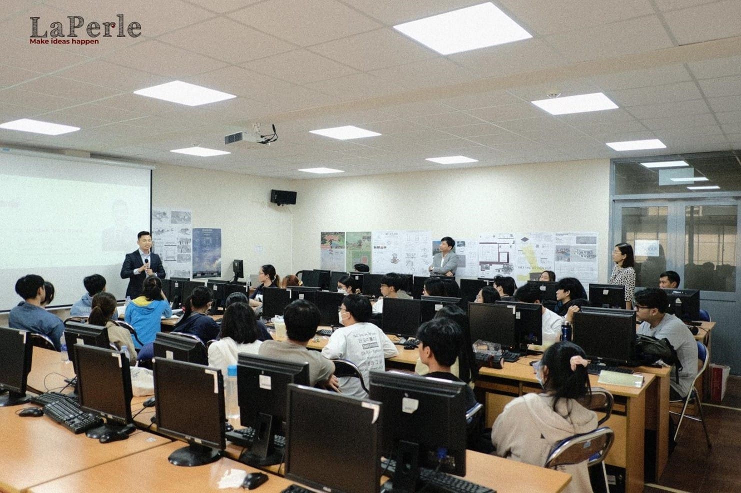 Undergraduates attentively listening to real-life stories from Dr. Duong Van Binh.